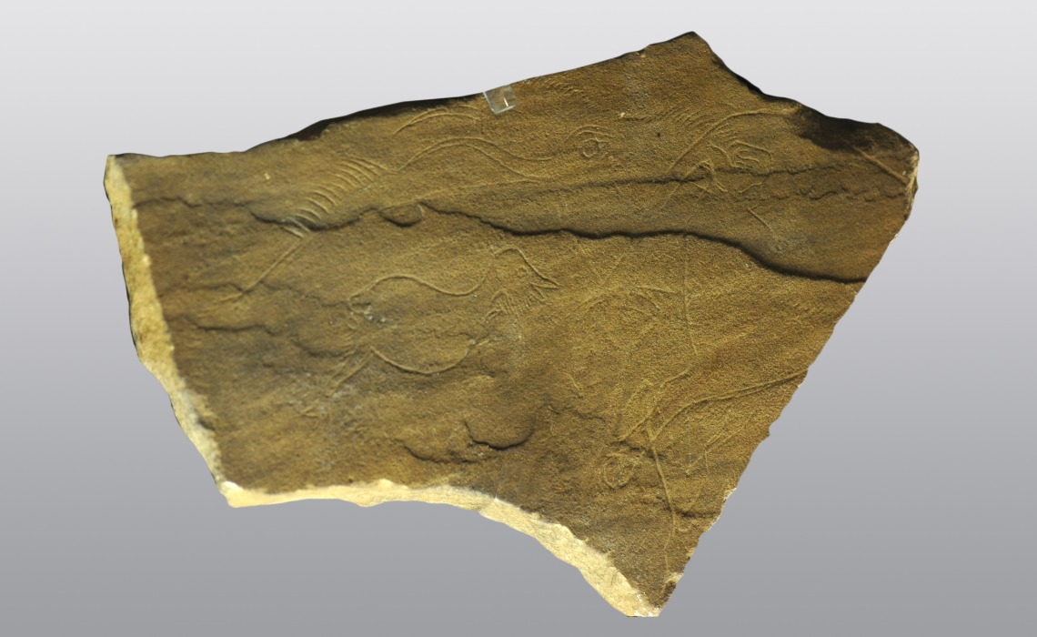Plaquette gravée, grès, Puy-de-Lacan, Paléolithique Supérieur.